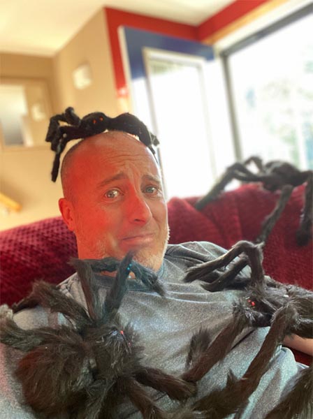 Wade covered in spiders